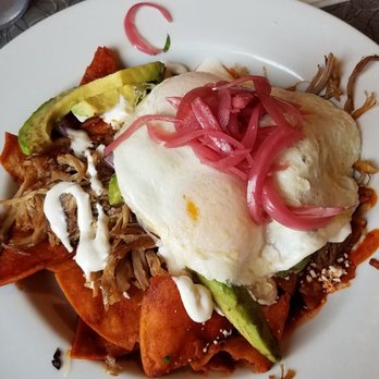 Toast - Carnitas Chilaquiles with over easy eggs. Add avocado. - Breakfast & Brunch Near Me - Littleton, Colorado Toast - Carnitas Chilaquiles with over easy eggs. Add avocado. - Breakfast & Brunch Near Me - Littleton, Colorado