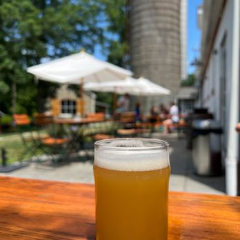 Fox Farm Brewery - a glass of beer on a wooden table - Breweries Near Me - Salem, Connecticut