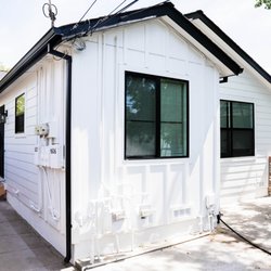 Heritage Exteriors Siding & Windows - James Hardie Lap and Board & Batten Siding with Co-Extruded Black Amsco Windows in Downtown Sacramento, CA.