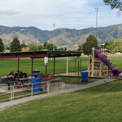 Plat C Park - Covered picnic table next to play structure