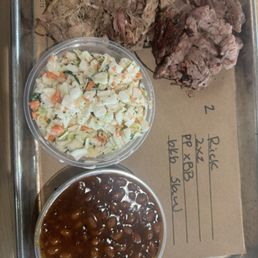 Pulled Pork, Brisket, Cole slaw and baked beans Pulled Pork, Brisket, Cole slaw and baked beans