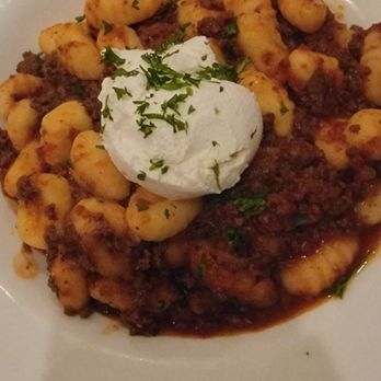 Robert's Scratch Kitchen - Gnocchi Bolognese Homemade gnocchi in a Bolognese meat sauce with a scoop of ricotta - New American Near Me - Totowa, New Jersey