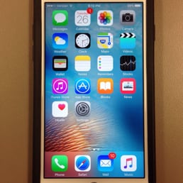White iPhone 6S with black OtterBox protection case.