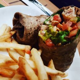 a burrito and french fries a burrito and french fries