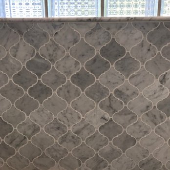 Lindgren Construction - Marble lantern tile tub surround - General Contractors Near Me