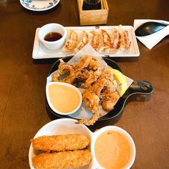 Nuna Ramen - a variety of food items on a table - Ramen Near Me - Seattle, Washington Nuna Ramen - a variety of food items on a table - Ramen Near Me - Seattle, Washington