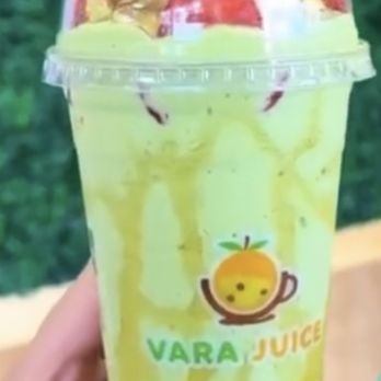 Vara juice - a hand holding a cup of fruit juice - Juice Bars & Smoothies Near Me - Bridgeview, Illinois Vara juice - a hand holding a cup of fruit juice - Juice Bars & Smoothies Near Me - Bridgeview, Illinois
