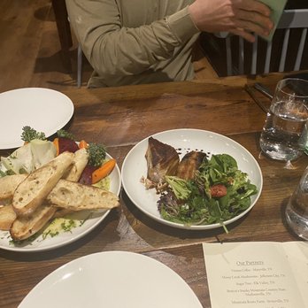 The Appalachian - Hummus plate with veggies and pork belly appetizers - Steakhouses Near Me - Sevierville, Tennessee The Appalachian - Hummus plate with veggies and pork belly appetizers - Steakhouses Near Me - Sevierville, Tennessee