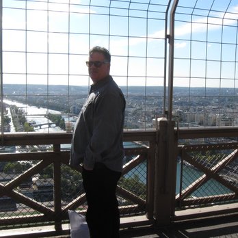 La Tour Eiffel - what the heck is he smuggling under that shirt - Landmarks & Historical Buildings Near Me - Paris, 75