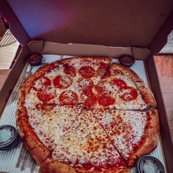 The Pizza Bandit - Half cheese pizza half pepperoni pizza