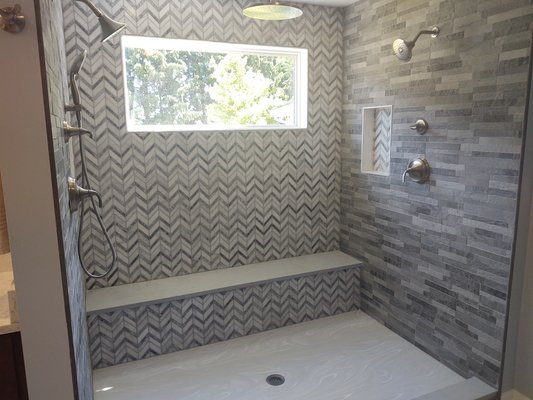 Landers Master Bathroom Renovation - Complete transformation on this one! Complete gut and removal of everything in here. We removed the old tub and old window and replaced it with a beautiful custom tiled walk in shower and brand new window. New flooring, new custom cabinetry, moved plumbing around to reconfigure toilet and vanity space! Call us today for a estimate on your next project! Our process includes 1:1 design support from start to finish. We will take you shopping and ensure your design choices have a lasting impression. We customize all of our cabinetry options to fit your spaces, no big box store standard cabinetry. We do not subcontract any of our services out, no strangers in your home. We will work with you directly from start to finish.