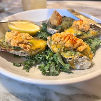 Peaches Prime - Oysters Rockefeller and Smoky Moscow Mule in the background. - Southern Near Me - Brooklyn, New York Peaches Prime - Oysters Rockefeller and Smoky Moscow Mule in the background. - Southern Near Me - Brooklyn, New York