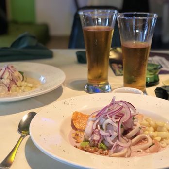 Ruta 57 Peruvian Restaurant - a plate of food and two glasses of beer - Seafood Near Me - Hialeah, Florida Ruta 57 Peruvian Restaurant - a plate of food and two glasses of beer - Seafood Near Me - Hialeah, Florida