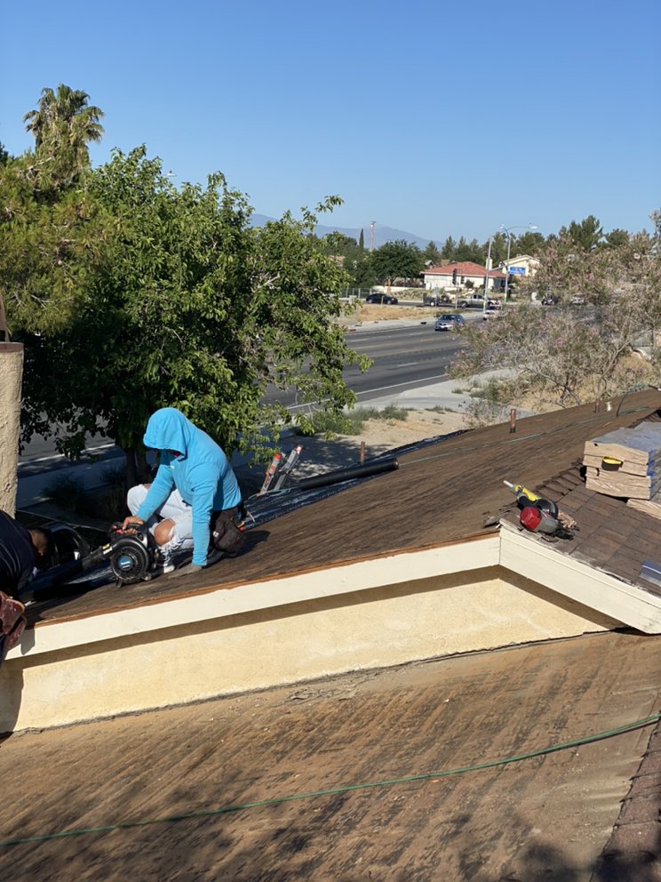 Slide of Elite Roofing