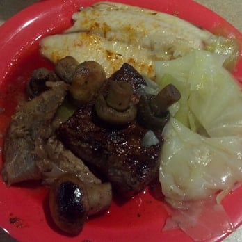 Golden Corral Buffet & Grill - Surf and Turf. Chunk of beef (med.) W/mushroom covering.  Pot roast,  Cajun cat fish and steamed cabbage. - American Near Me - Bradenton, Florida