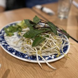 Pho 33 - Veggie topping plate - bean sprouts, thai basil, jalapeño, and lime slices. Would love to see more bean sprouts.
