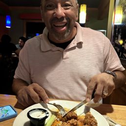 Hubby having boneless wings. They were overcooked, hard on the roof of the mouth.