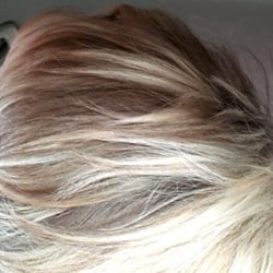 WM DaySpa Salon - Here is a photo of the top of my hair after my color process.  The top was pink and orange. The weird blonde strip was yellow.