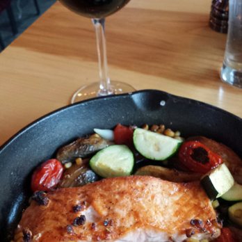 The Bench - My big size, partially consumed malbec and the delicious oven roast salmon with veggies. - Pizza Near Me - Stowe, Vermont The Bench - My big size, partially consumed malbec and the delicious oven roast salmon with veggies. - Pizza Near Me - Stowe, Vermont