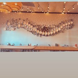 Cool wall with bowls all over ! So cute