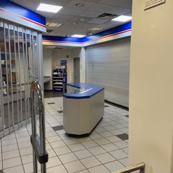 USPS - Closed up tight. Online says they are open. 4:15 on Friday.