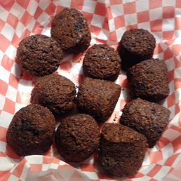 a basket of chocolate muffins a basket of chocolate muffins