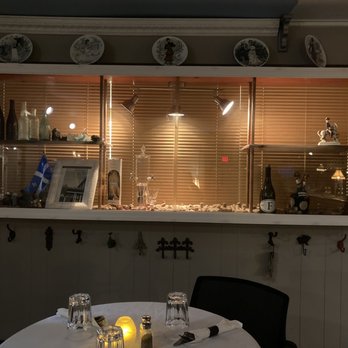 Tighe's Bistro Americain - Antique display case with artifacts from historic building - French Near Me - Averill Park, New York