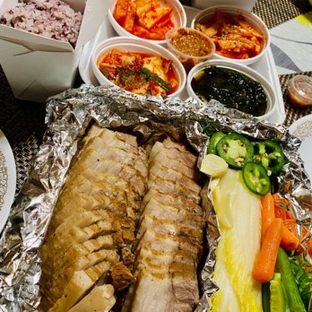 Ap Gu Jung - bossam (boiled pork belly) + 2 purple rice + extra garlic + saewoojeot (korean style fermented shrimp paste). Comes with banchan/side dishes - Korean Near Me - Diamond Bar, California