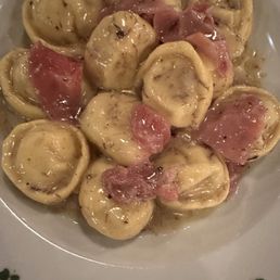 Cappelletti ( little truffle ravioli) in a way too buttery sauce with prosciutto Cappelletti ( little truffle ravioli) in a way too buttery sauce with prosciutto