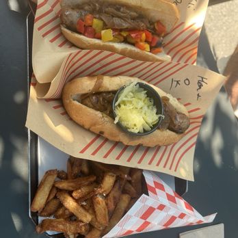 Wurstküche - Filipino Maharlika (top), Hungarian Heat w/kraut on the side, fries - Hot Dogs Near Me - Los Angeles, California Wurstküche - Filipino Maharlika (top), Hungarian Heat w/kraut on the side, fries - Hot Dogs Near Me - Los Angeles, California