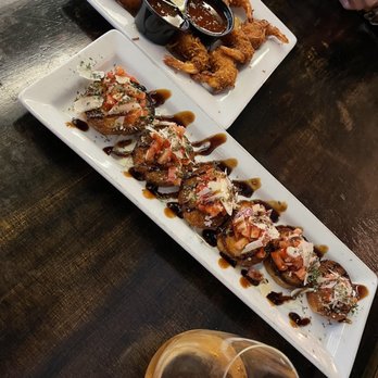 Destino's - two plates of appetizers and a glass of wine - Pizza Near Me - Merced, California Destino's - two plates of appetizers and a glass of wine - Pizza Near Me - Merced, California