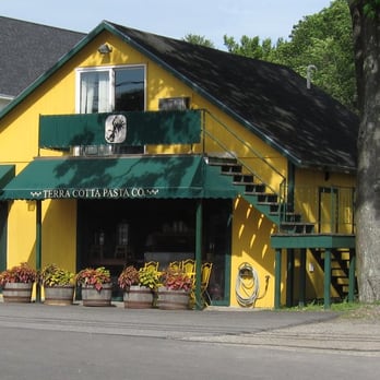 Terra Cotta Pasta Co - a yellow building with a green awning - Pasta Shops Near Me - Kittery, Maine Terra Cotta Pasta Co - a yellow building with a green awning - Pasta Shops Near Me - Kittery, Maine