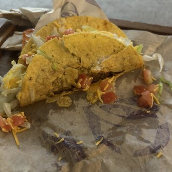 Taco Bell - Taco Bell taco in a shambles. - Fast Food Near Me - Wentzville, Missouri Taco Bell - Taco Bell taco in a shambles. - Fast Food Near Me - Wentzville, Missouri