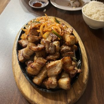 Ku Sushi and Izakaya - Grilled Pork Belly Kimchi - Sushi Bars Near Me - Seattle, Washington Ku Sushi and Izakaya - Grilled Pork Belly Kimchi - Sushi Bars Near Me - Seattle, Washington