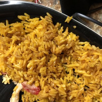 China Spring - a plate of yellow rice and chicken - Chinese Near Me - Nashville, Tennessee China Spring - a plate of yellow rice and chicken - Chinese Near Me - Nashville, Tennessee