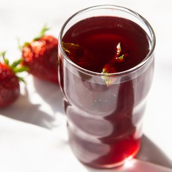 Mumbai Dakar Restaurant - a glass of tea with strawberries - Indian Near Me - Edmonton, Alberta Mumbai Dakar Restaurant - a glass of tea with strawberries - Indian Near Me - Edmonton, Alberta