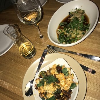 True Food Kitchen - Charred Cauliflower (bottom) Edamame Dumplings (top) - New American Near Me - Chicago, Illinois True Food Kitchen - Charred Cauliflower (bottom) Edamame Dumplings (top) - New American Near Me - Chicago, Illinois
