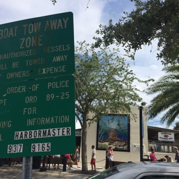 Sponge Docks - Boat tow away zone (cool mural in the background) - Gift Shops Near Me - Tarpon Springs, Florida Sponge Docks - Boat tow away zone (cool mural in the background) - Gift Shops Near Me - Tarpon Springs, Florida