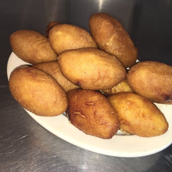 Collado Restaurant - Sorullitos de maiz  Corn bread with yellow cheese inside of them - Spanish Near Me - New Haven, Connecticut
