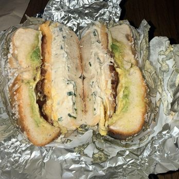 Bagel Pub - Bacon Egg and Cheese with avocado and garlic and herb cream cheese on a salt bagel - Bagels Near Me - New York, New York Bagel Pub - Bacon Egg and Cheese with avocado and garlic and herb cream cheese on a salt bagel - Bagels Near Me - New York, New York