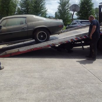 DJ Towing - John is carefully loading my husband's "baby" onto the tow truck - Towing Near Me