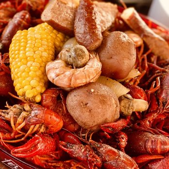 Willie's Grill & Icehouse - a platter of crawfish, corn and potatoes - American Near Me - Sugar Land, Texas Willie's Grill & Icehouse - a platter of crawfish, corn and potatoes - American Near Me - Sugar Land, Texas