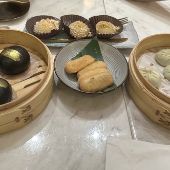Supreme Dumplings - Desserts - lava custard bun, deep fried brown sugar mochi, matcha dumpling, and black sesame mochi with peanut on coating - Shanghainese Near Me - Honolulu, Hawaii Supreme Dumplings - Desserts - lava custard bun, deep fried brown sugar mochi, matcha dumpling, and black sesame mochi with peanut on coating - Shanghainese Near Me - Honolulu, Hawaii