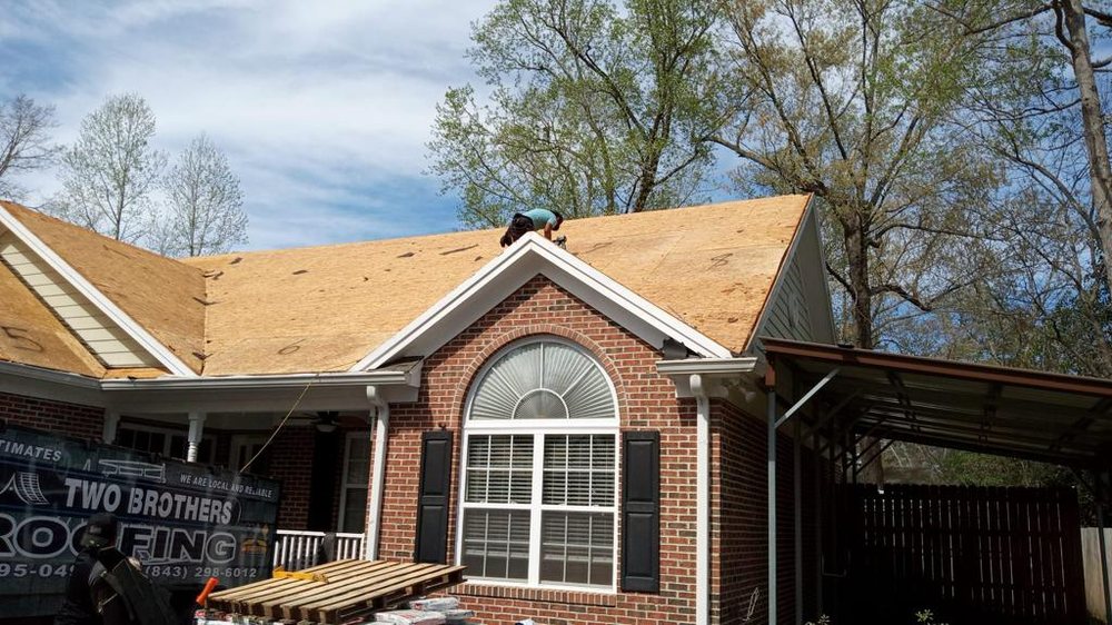 Slide of Two Brothers Roofing