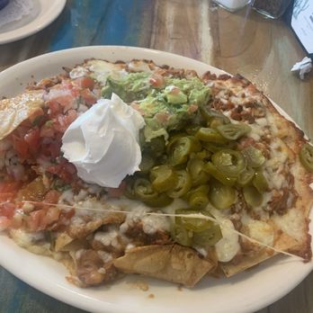 Blue Coyote Grill - Nachos with shredded beef. - Mexican Near Me - Palm Springs, California Blue Coyote Grill - Nachos with shredded beef. - Mexican Near Me - Palm Springs, California