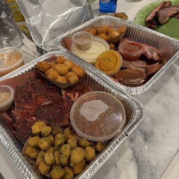 The Smoke Pit - Okra, beans, hush puppies, jalapeno creamed corn, half rack ribs, sausage, brisket - American Near Me - Mooresville, North Carolina The Smoke Pit - Okra, beans, hush puppies, jalapeno creamed corn, half rack ribs, sausage, brisket - American Near Me - Mooresville, North Carolina