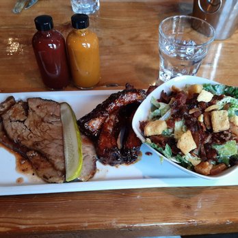 Barque Smokehouse - BBQ Sampler ($19) - smoked brisket, Kansas City style ribs, Barque Caesar salad. BBQ and Mustard sauce at the table - Barbeque Near Me - Toronto, Ontario Barque Smokehouse - BBQ Sampler ($19) - smoked brisket, Kansas City style ribs, Barque Caesar salad. BBQ and Mustard sauce at the table - Barbeque Near Me - Toronto, Ontario