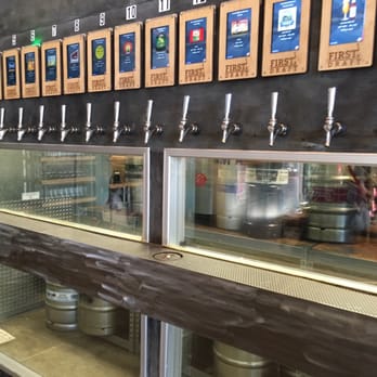 First Draft Taproom & Kitchen - Beer selection wall - Bars Near Me - Denver, Colorado First Draft Taproom & Kitchen - Beer selection wall - Bars Near Me - Denver, Colorado