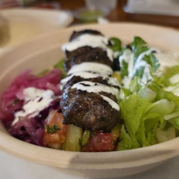 The Kebab Shop - Beef kofta and saffron rice. That OG sauce is unreal! - Mediterranean Near Me - Houston, Texas