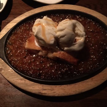 Favela Grill - Apple Pie with caramel and vanilla ice cream - Brazilian Near Me - Astoria, New York Favela Grill - Apple Pie with caramel and vanilla ice cream - Brazilian Near Me - Astoria, New York